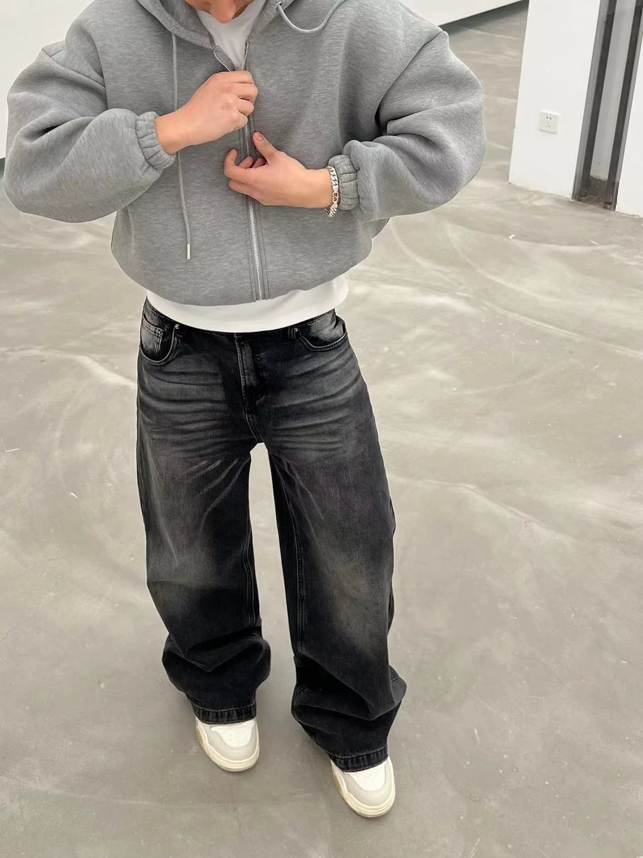 Gray Zip-Up Hoodie with Black Jeans