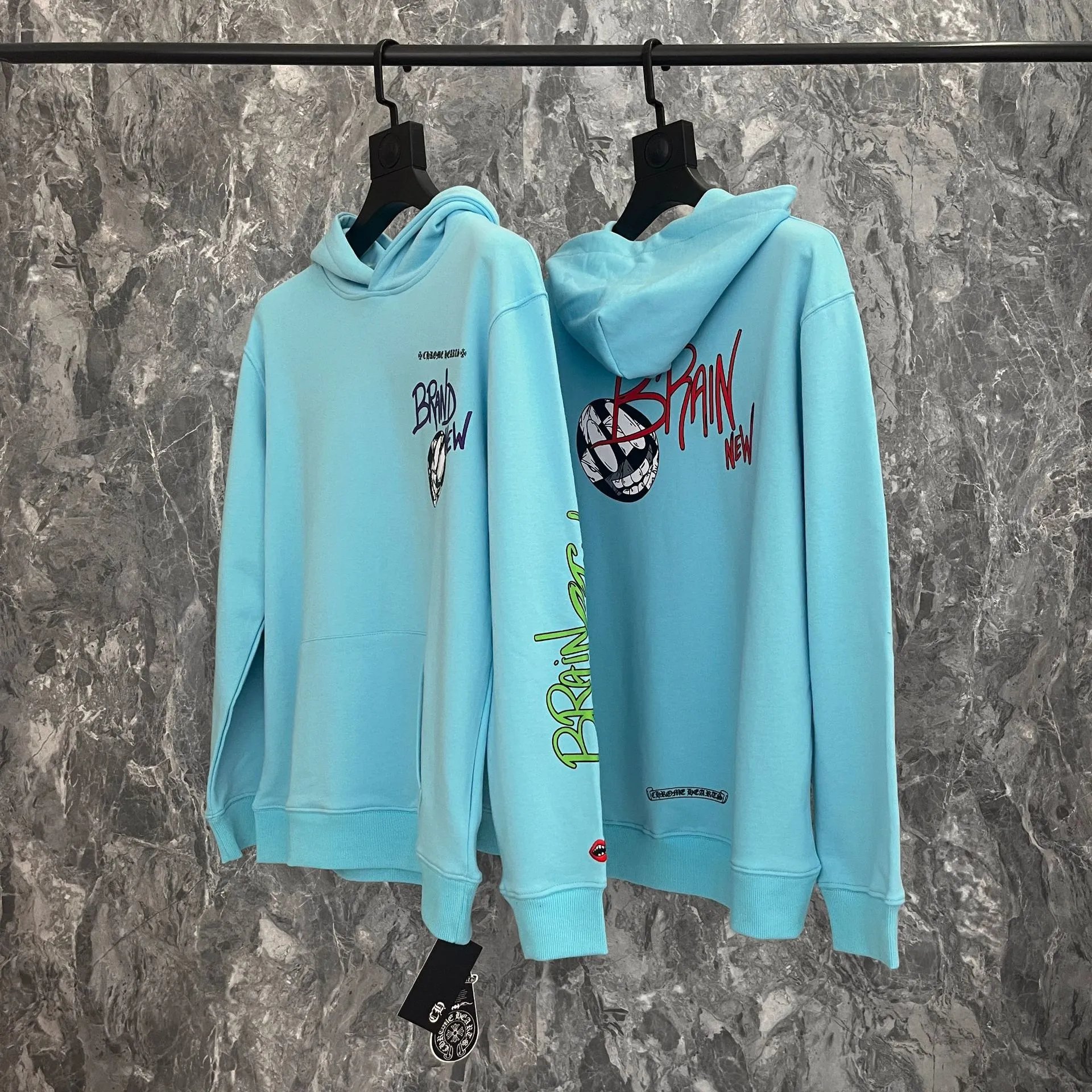 Light Blue Hoodie with Graphic Print
