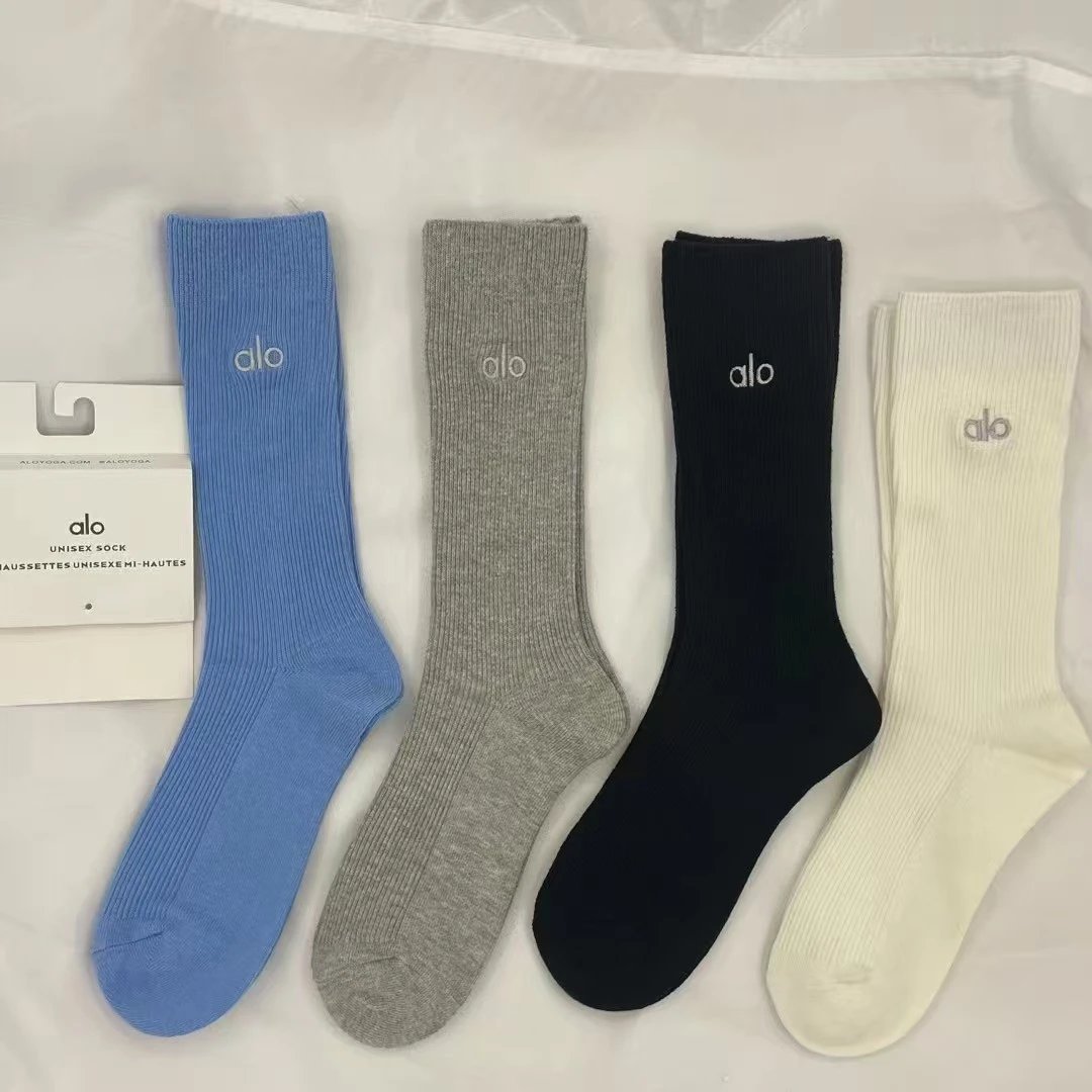Alo Unisex Knee-High Socks in Blue, Grey, Black, and White