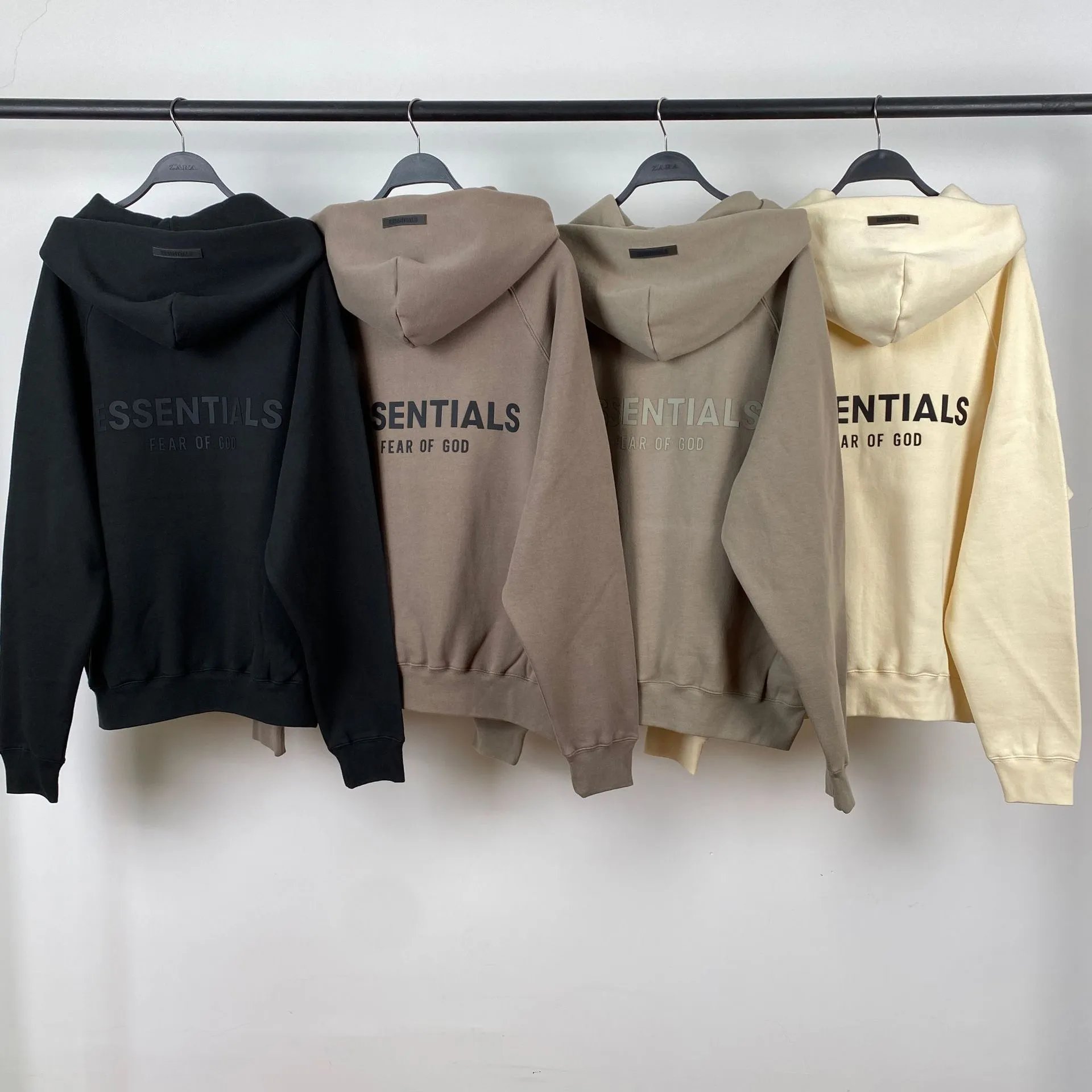 Fear of God Essentials Hoodie in Black, Beige, Khaki, and Cream