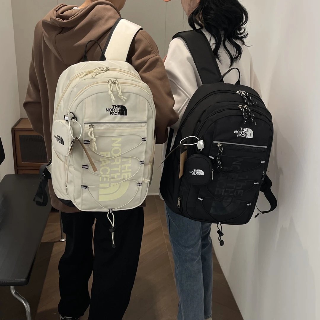 The North Face White and Black Backpacks