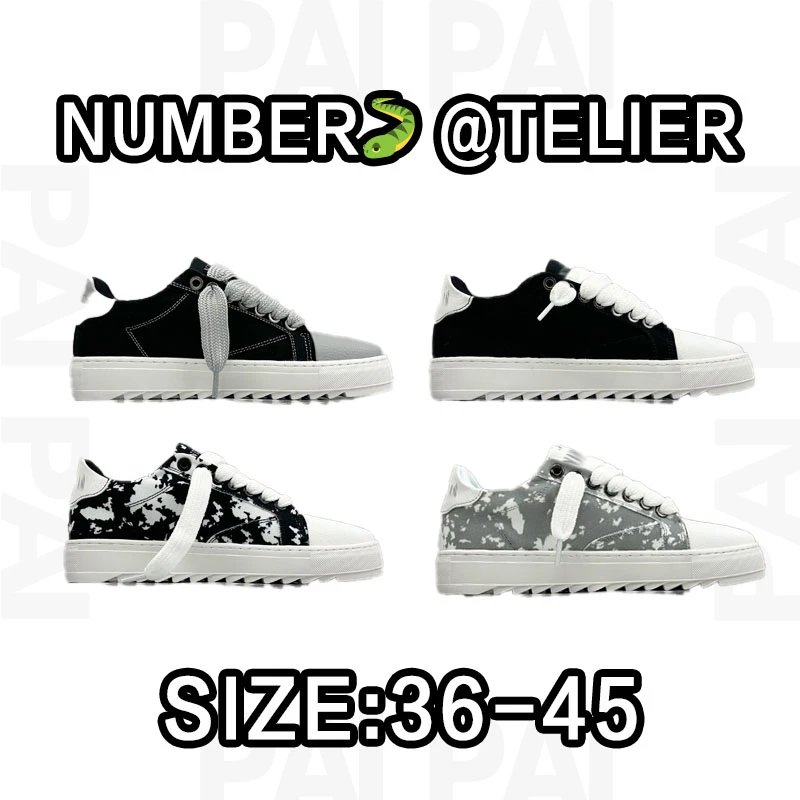 Number Eight Telier Black and White Low Top Sneakers