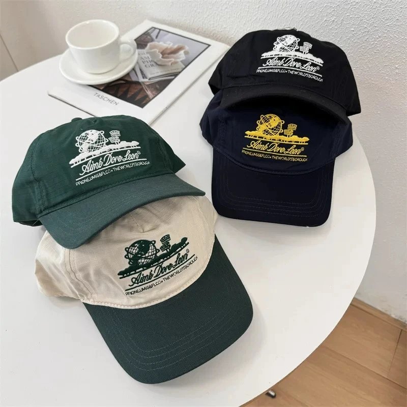 Aime's Dove Leon Baseball Caps in Green, Black, and Beige