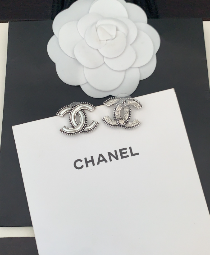 Chanel Silver CC Log