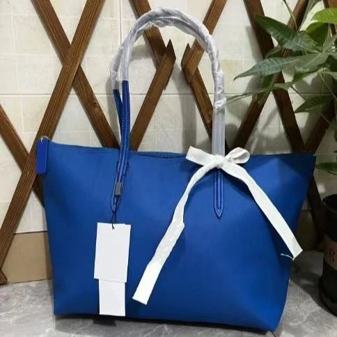 Lacoste Blue Tote Bag with White Bow Detail