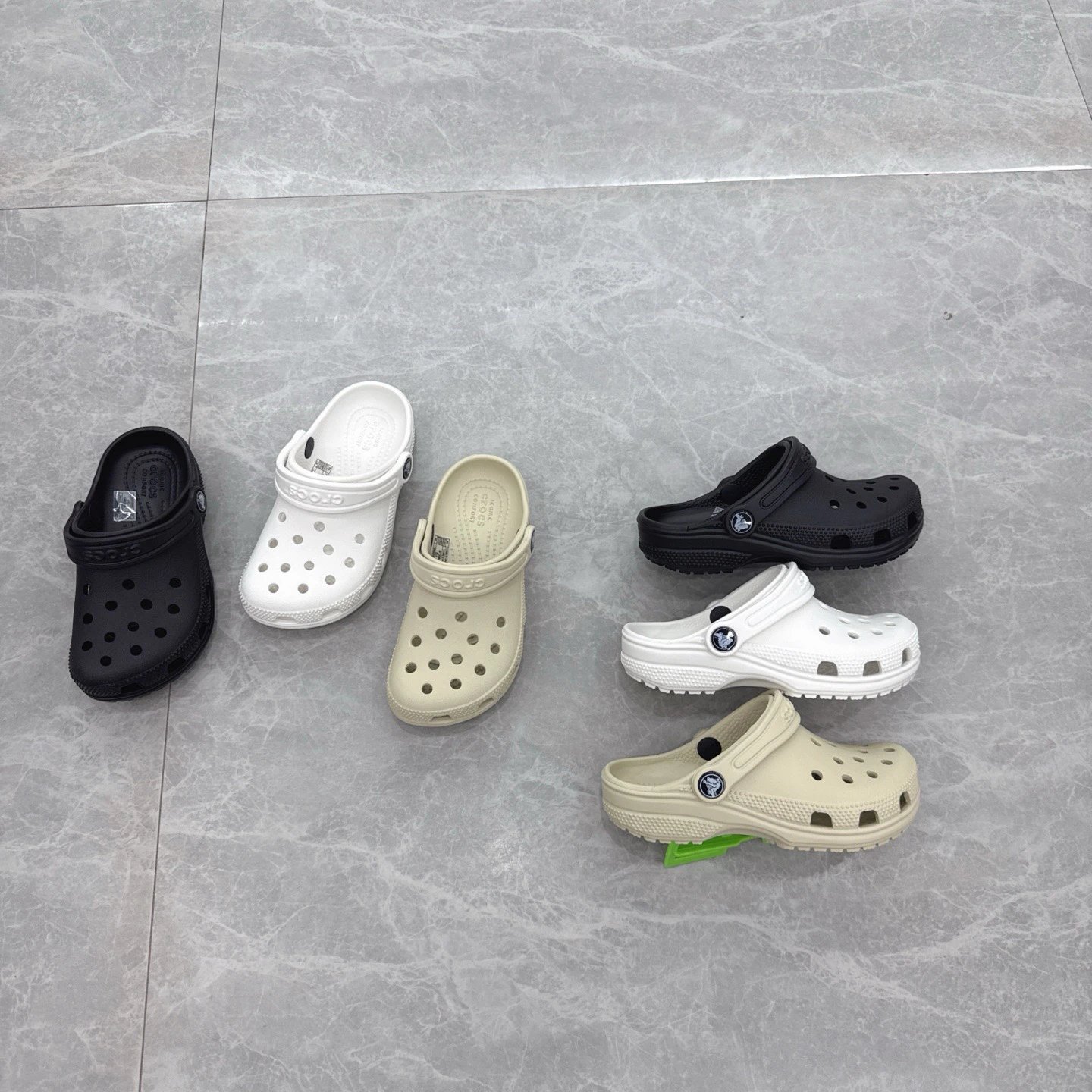 Kid Crocs Classic Clogs in Black, White, and Beige
