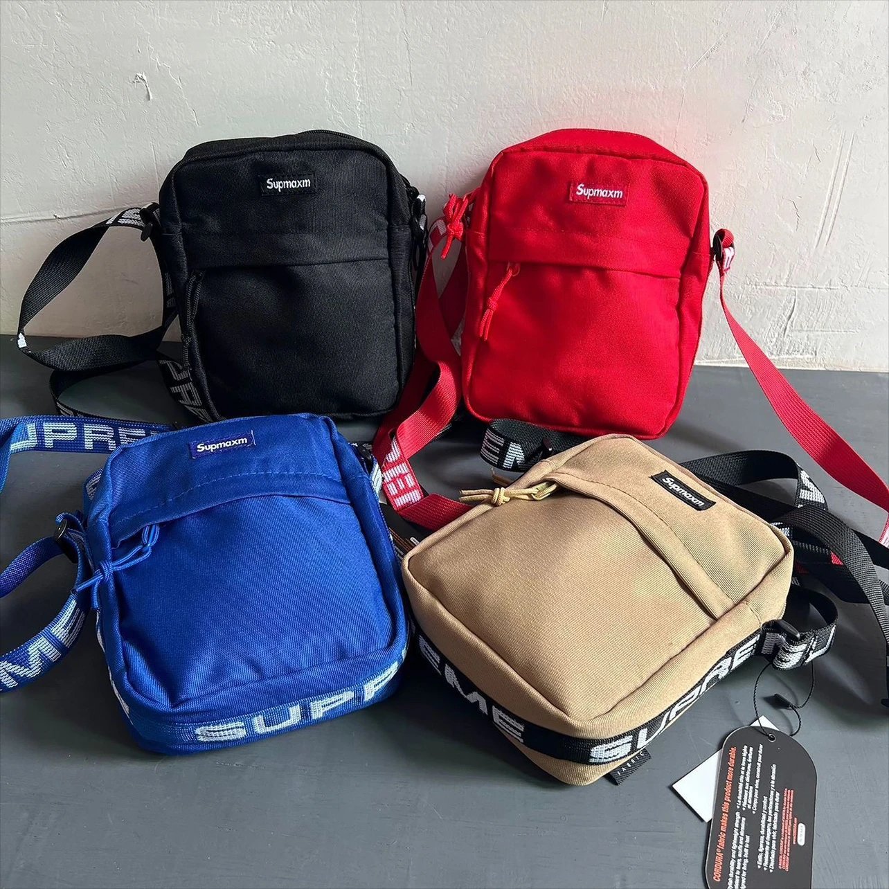 Supremaxm Crossbody Bag in Black, Red, Blue, and Beige